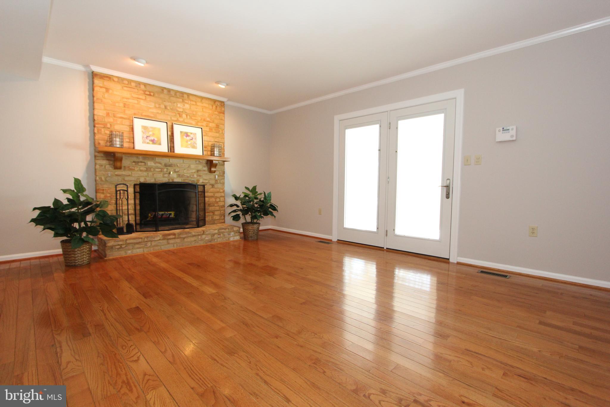 8100 Laurel Ridge Road Frederick, MD 21702 - Photo 20 of 53 Huge family room with brick hearth fireplace