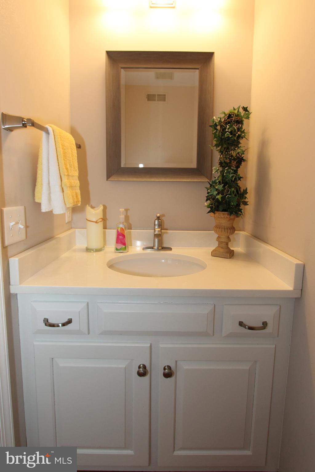 8100 Laurel Ridge Road Frederick, MD 21702 - Photo 23 of 53 Remodeled powder room with quartz counters