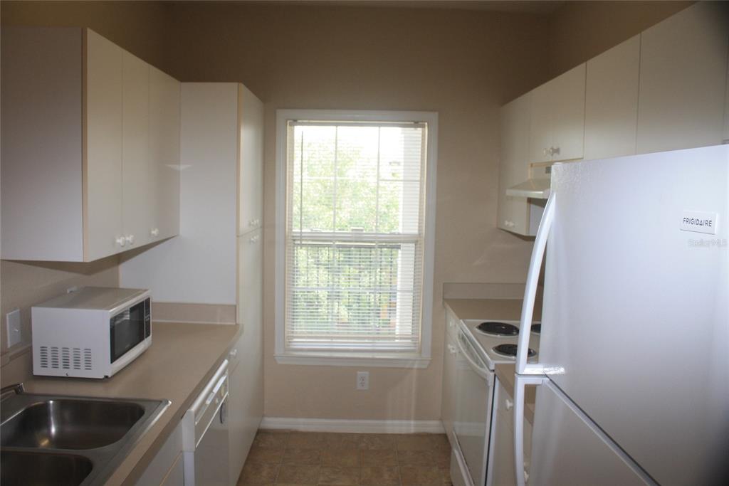 3621 Conroy Road, Unit 739 Orlando, FL 32839 - Photo 11 of 20 a room with storage and utility
