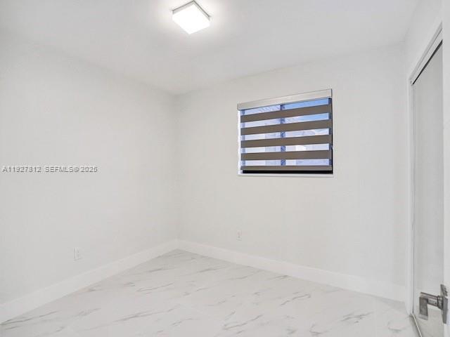 7881 Hope Street Hollywood, FL 33024 - Photo 11 of 39 a view of empty room with windows