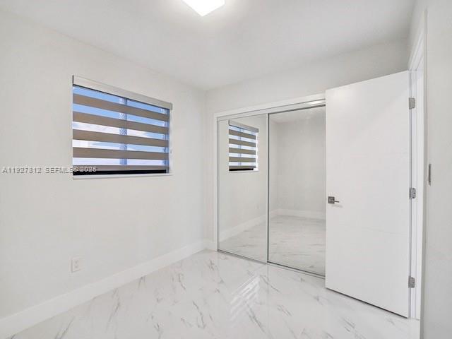7881 Hope Street Hollywood, FL 33024 - Photo 14 of 39 a view of an empty room with window
