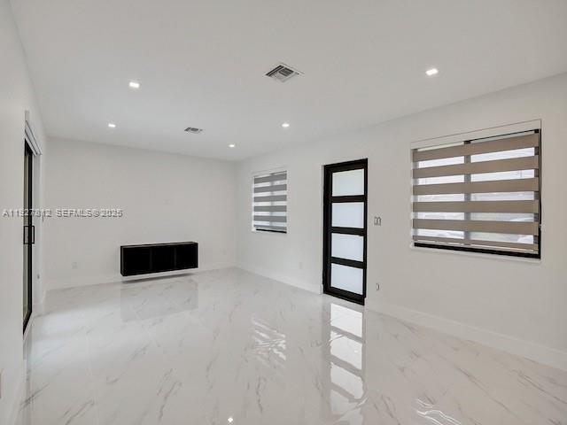 7881 Hope Street Hollywood, FL 33024 - Photo 19 of 39 a view of an empty room with a window