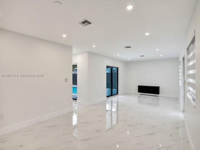 7881 Hope Street Hollywood, FL 33024 - Photo 23 of 39 a view of an empty room with a window