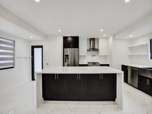 7881 Hope Street Hollywood, FL 33024 - Photo 24 of 39 a kitchen with a sink stainless steel appliances and cabinets