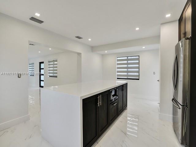 7881 Hope Street Hollywood, FL 33024 - Photo 28 of 39 a kitchen with stainless steel appliances a refrigerator and a refrigerator
