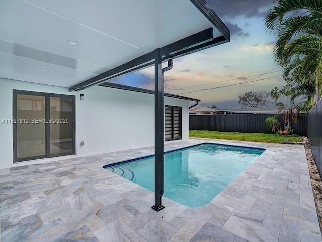 7881 Hope Street Hollywood, FL 33024 - Photo 38 of 39 a view of swimming pool with yard