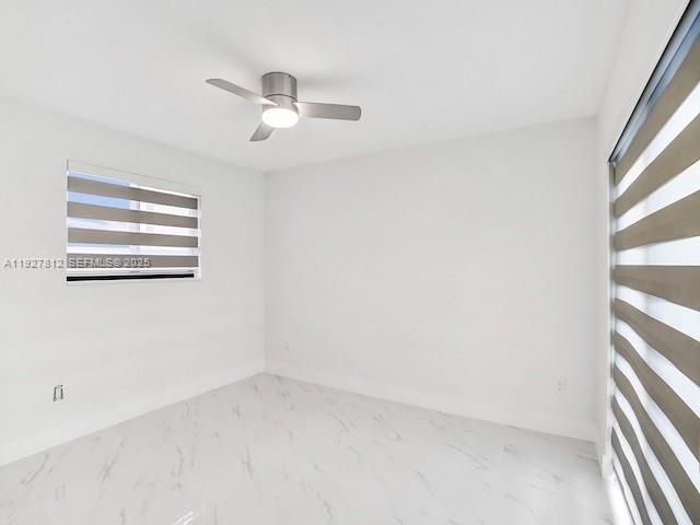 7881 Hope Street Hollywood, FL 33024 - Photo 6 of 39 an empty room with a window