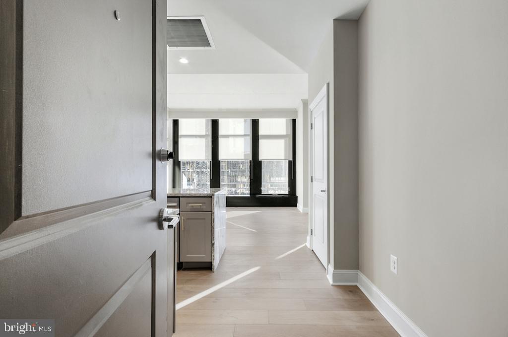 30 North 23rd Street, Unit 2402 Philadelphia, PA 19103 - Photo 14 of 42 a view of an entryway with wooden floor