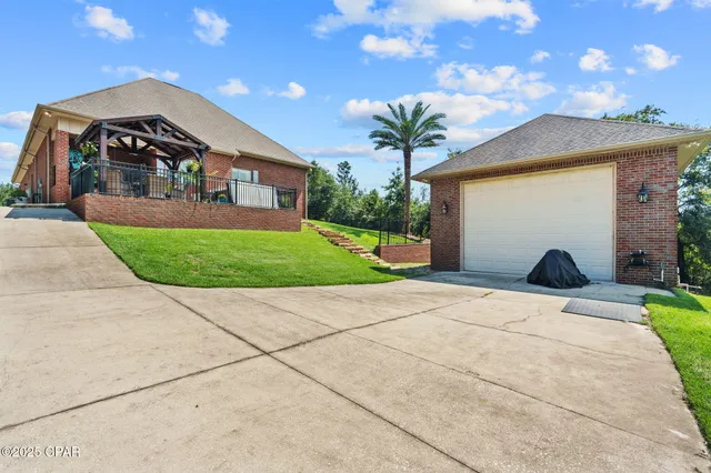 $975,000 | 111 Lake Merial Boulevard, Panama City, FL 32409