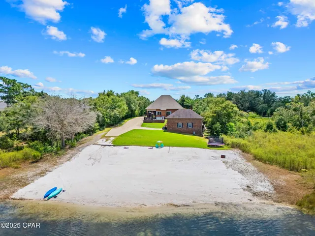$975,000 | 111 Lake Merial Boulevard, Panama City, FL 32409