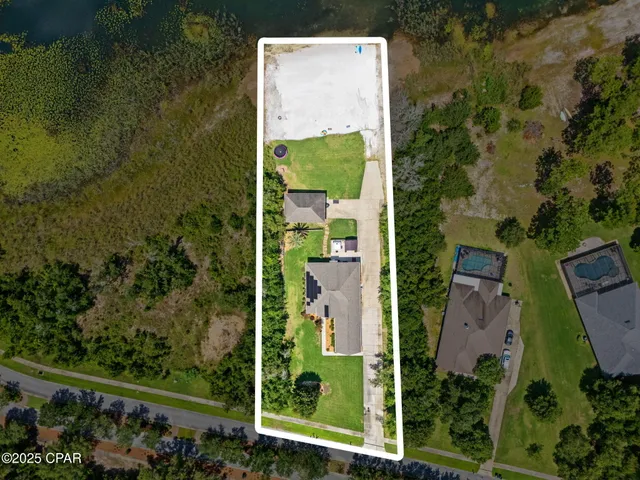 $975,000 | 111 Lake Merial Boulevard, Panama City, FL 32409
