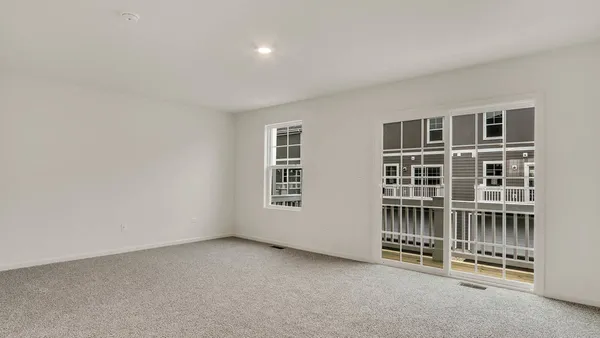 an empty room with windows