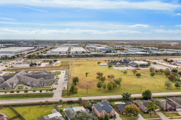 an aerial view of residential building and lake view