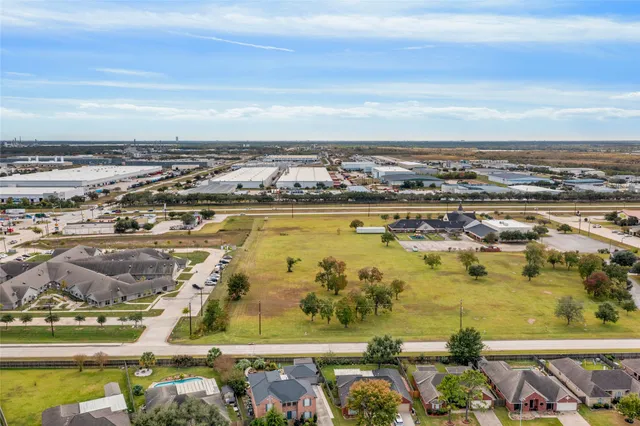 an aerial view of residential building and lake view