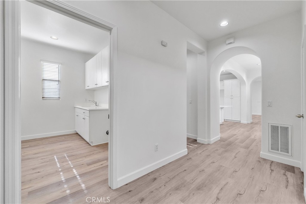 180 Heartwood Way Anaheim, CA 92801 - Photo 17 of 38 a view of a room with wooden floor