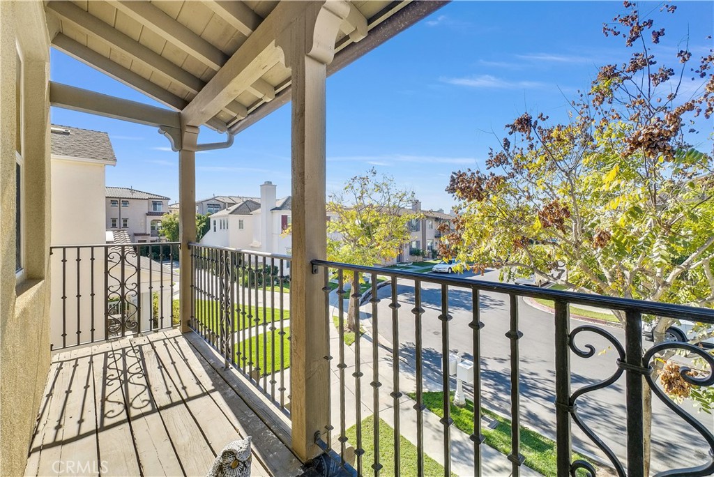 180 Heartwood Way Anaheim, CA 92801 - Photo 34 of 38 a view of a balcony with wooden floor