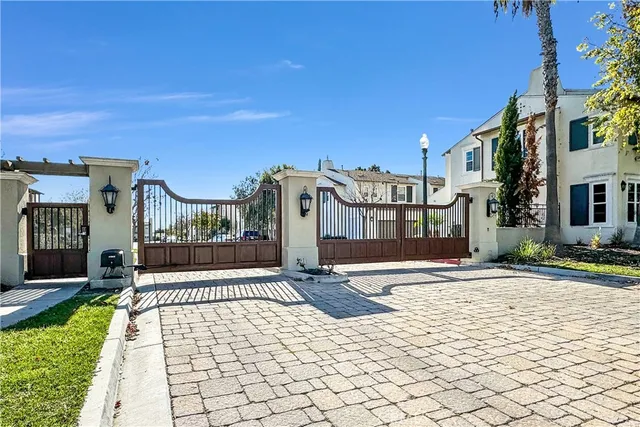 a view of a building with a bench in front of house