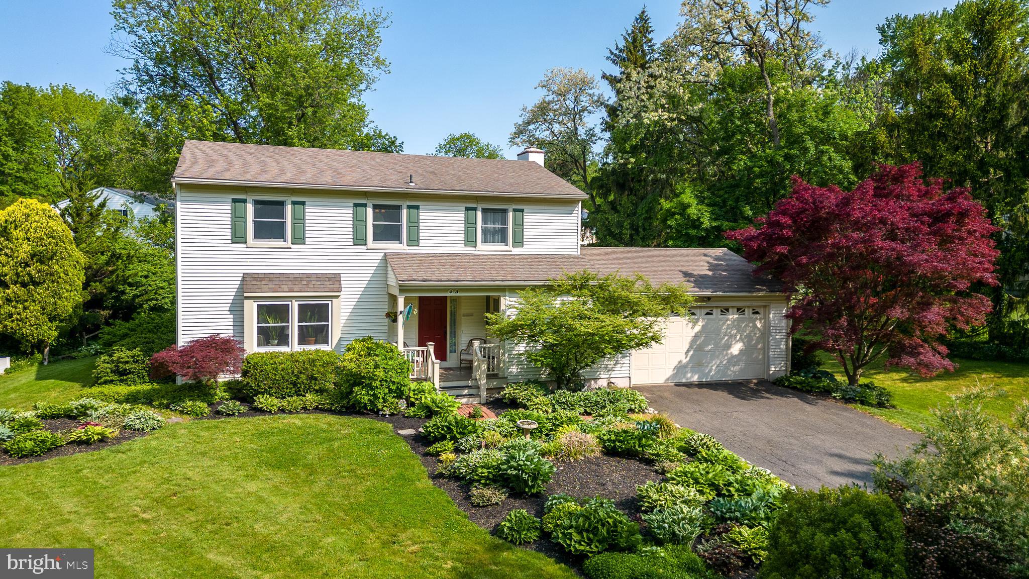 43 Clemens Road Doylestown, PA 18901 - Photo 1 of 34 a front view of a house with a garden