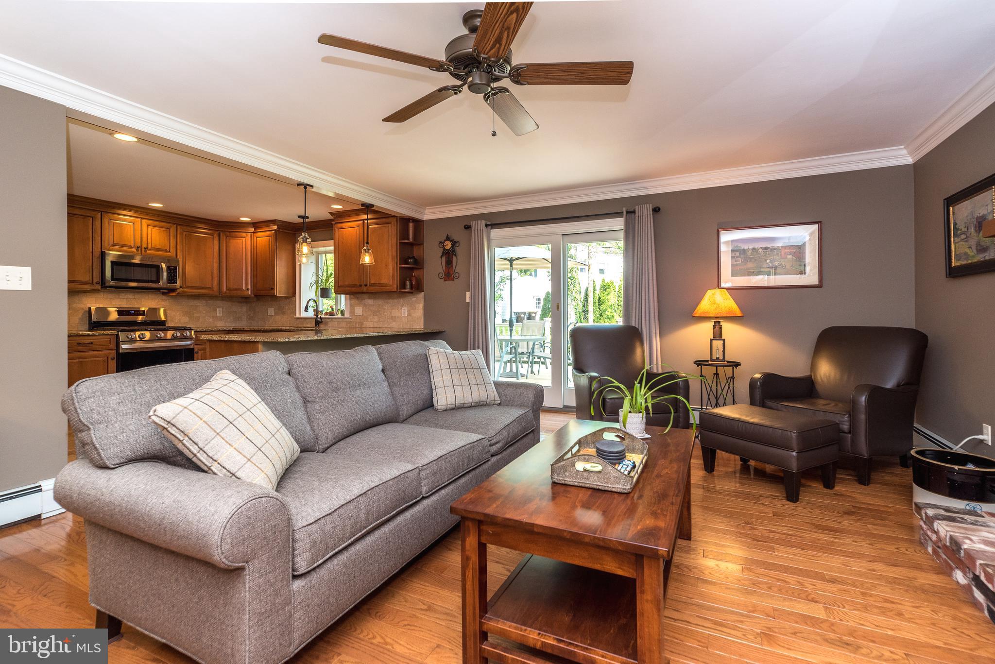 43 Clemens Road Doylestown, PA 18901 - Photo 16 of 34 a living room with furniture and a wooden floor
