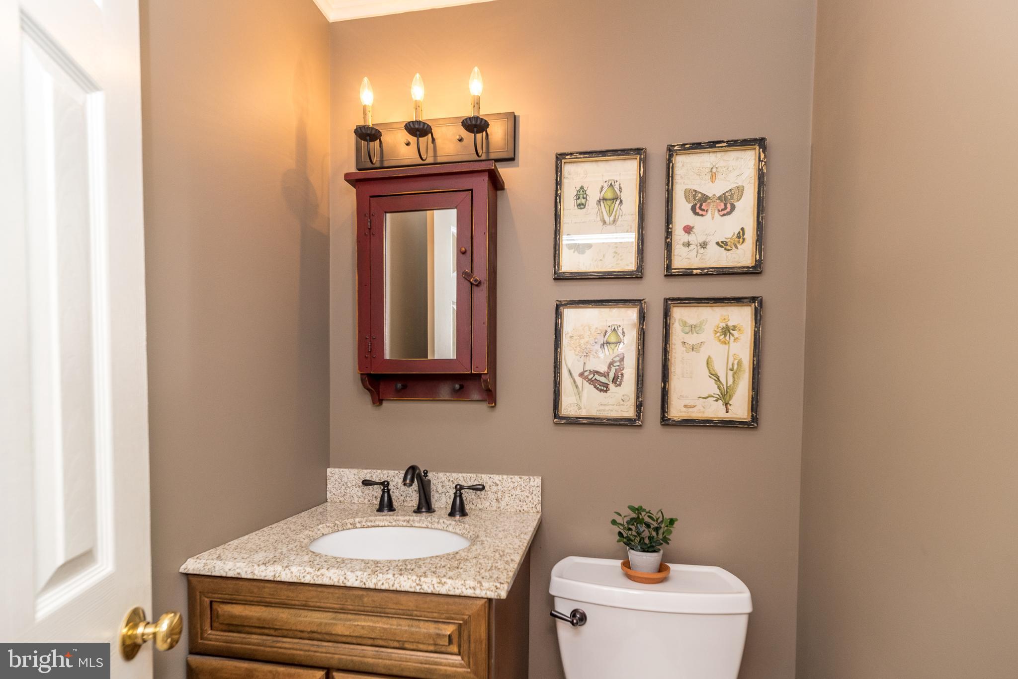 43 Clemens Road Doylestown, PA 18901 - Photo 20 of 34 a bathroom with a sink and a mirror