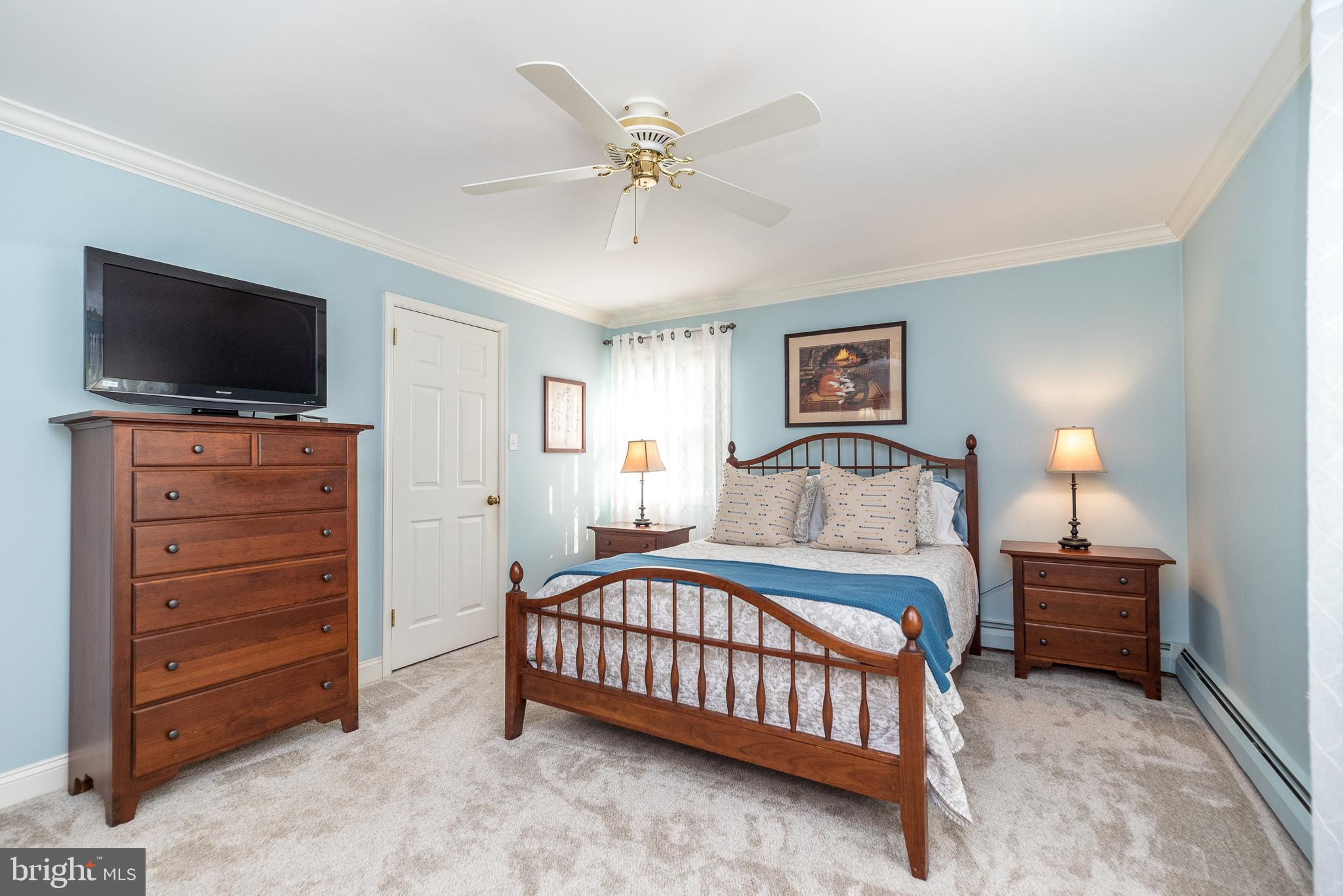 43 Clemens Road Doylestown, PA 18901 - Photo 22 of 34 a bedroom with a bed and a flat screen tv