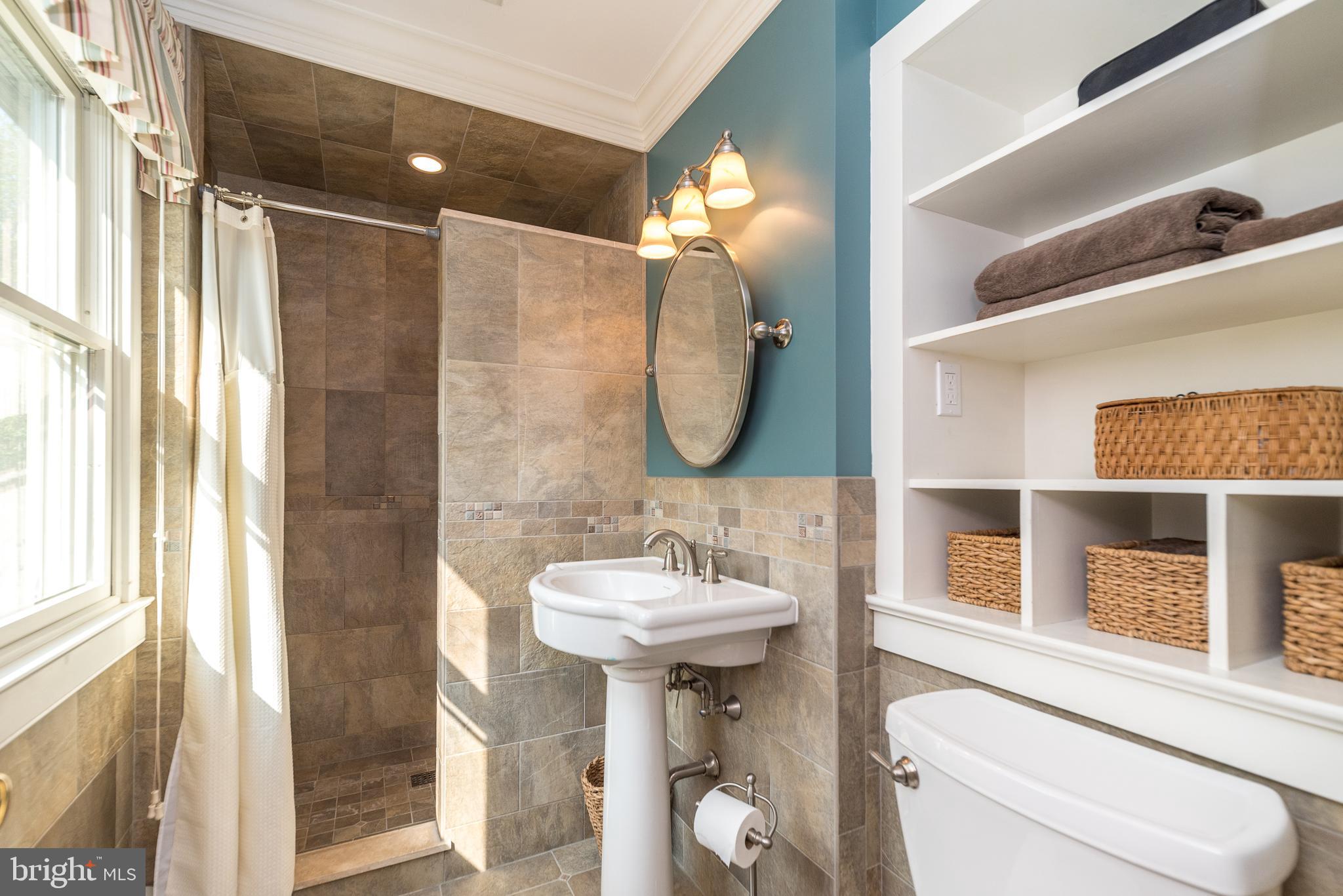 43 Clemens Road Doylestown, PA 18901 - Photo 23 of 34 a bathroom with a sink toilet and shower