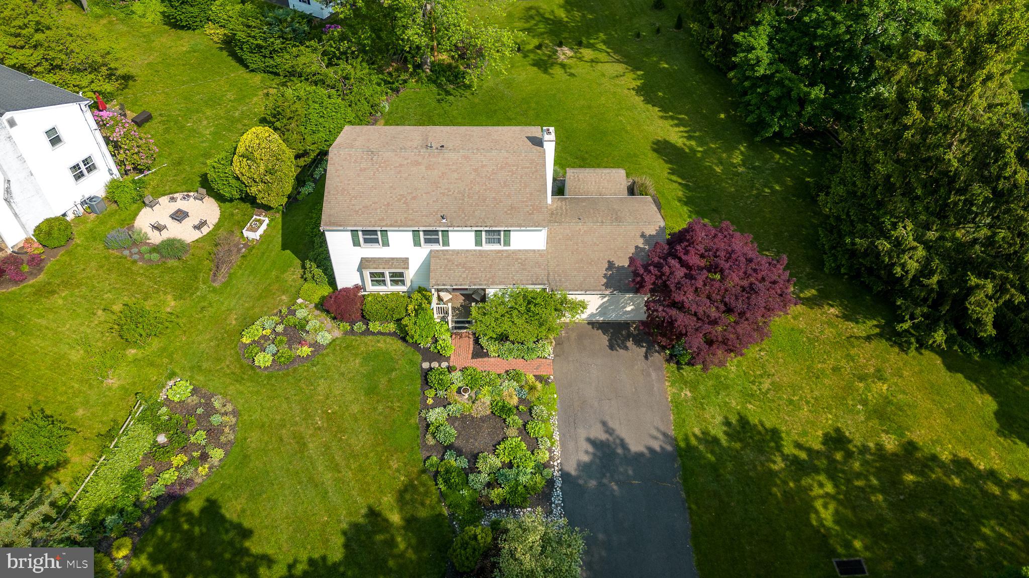 43 Clemens Road Doylestown, PA 18901 - Photo 3 of 34 view of a house with a yard and garden