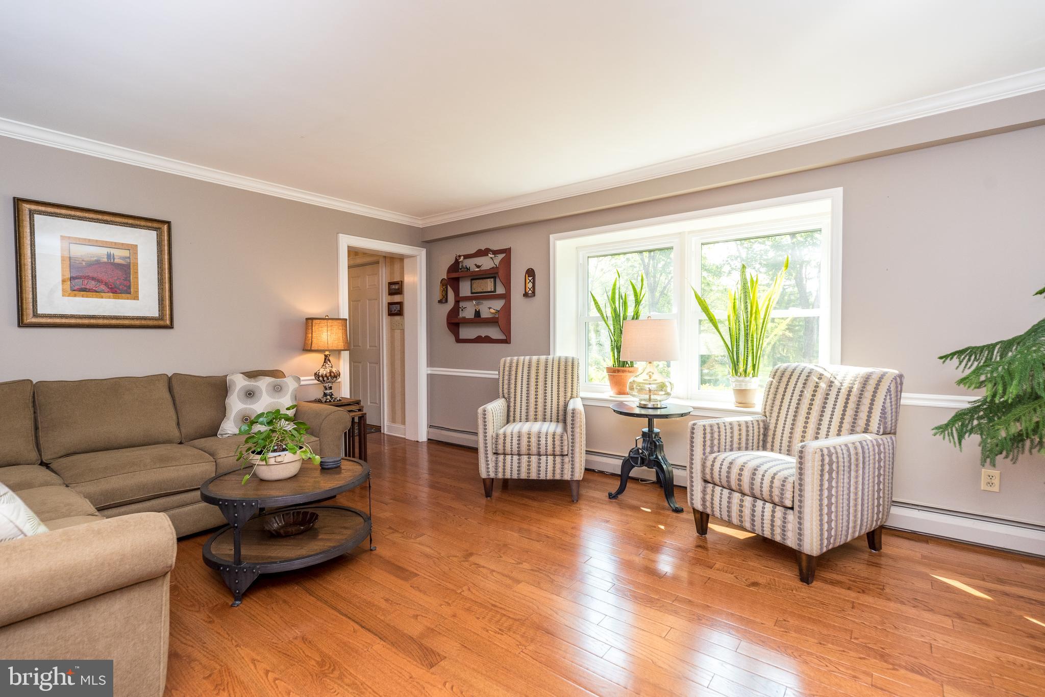 43 Clemens Road Doylestown, PA 18901 - Photo 7 of 34 a living room with furniture and a large window