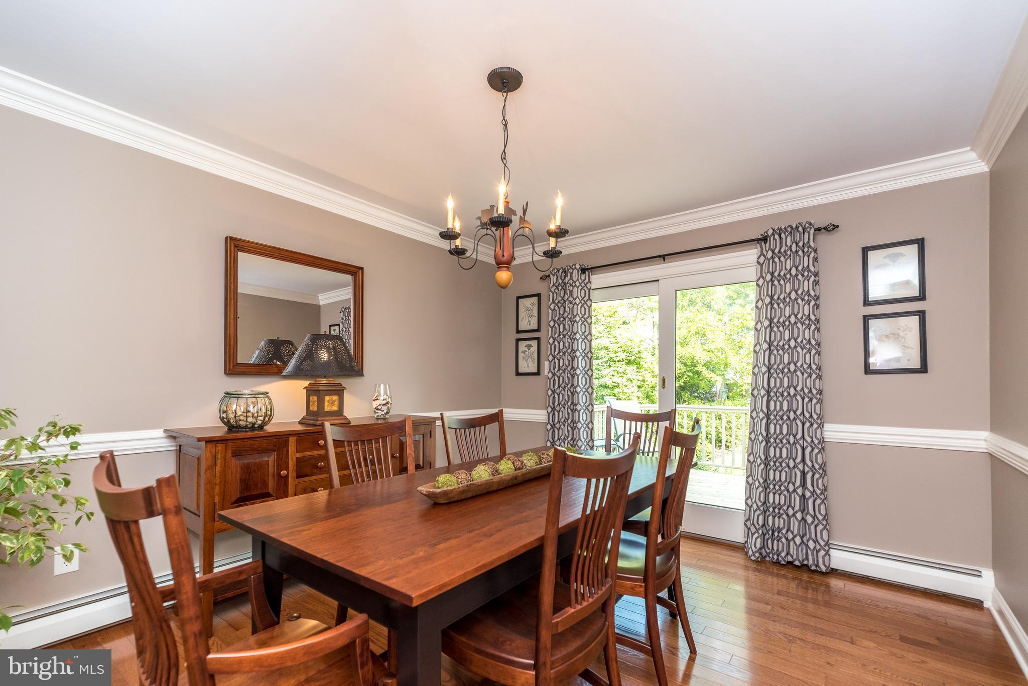 43 Clemens Road Doylestown, PA 18901 - Photo 9 of 34 a view of a dining room with furniture window and wooden floor