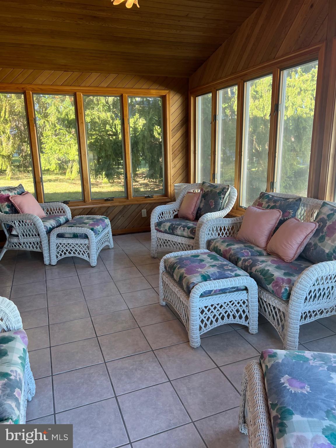 457 Kennerly Road Springfield, PA 19064 - Photo 7 of 9 a living room with furniture and a large window