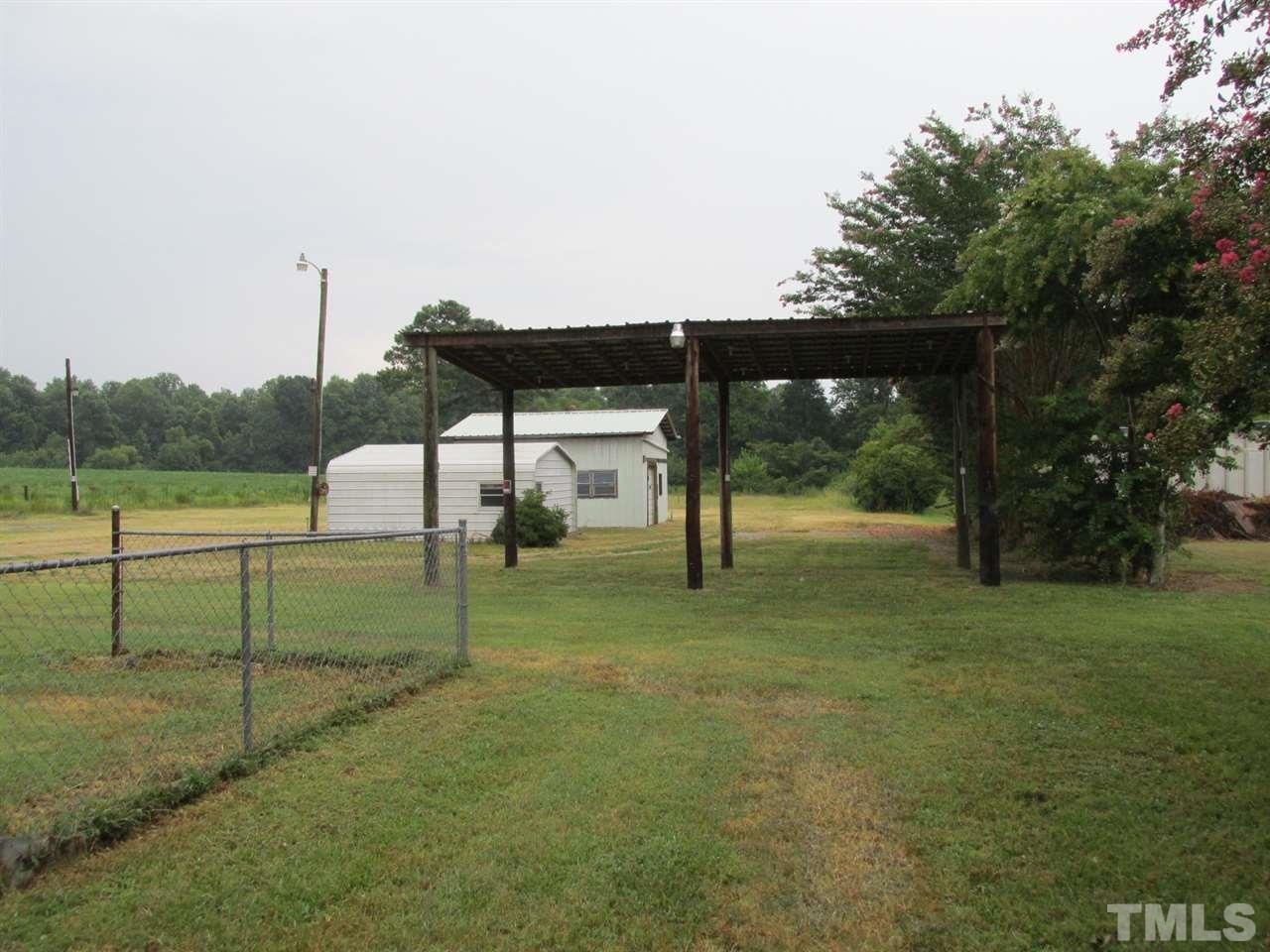 8617 Walter Myatt Road Willow Spring, NC 27592 - Photo 11 of 22 a view of backyard with green space