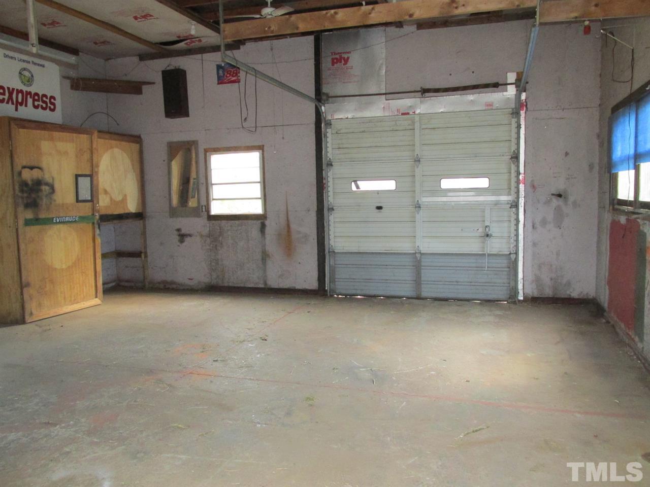 8617 Walter Myatt Road Willow Spring, NC 27592 - Photo 10 of 22 a view of a storage & utility room