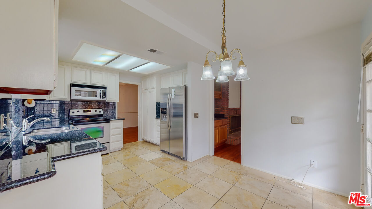 17 Firestone Irvine, CA 92614 - Photo 22 of 75 a view of a livingroom with furniture and furniture