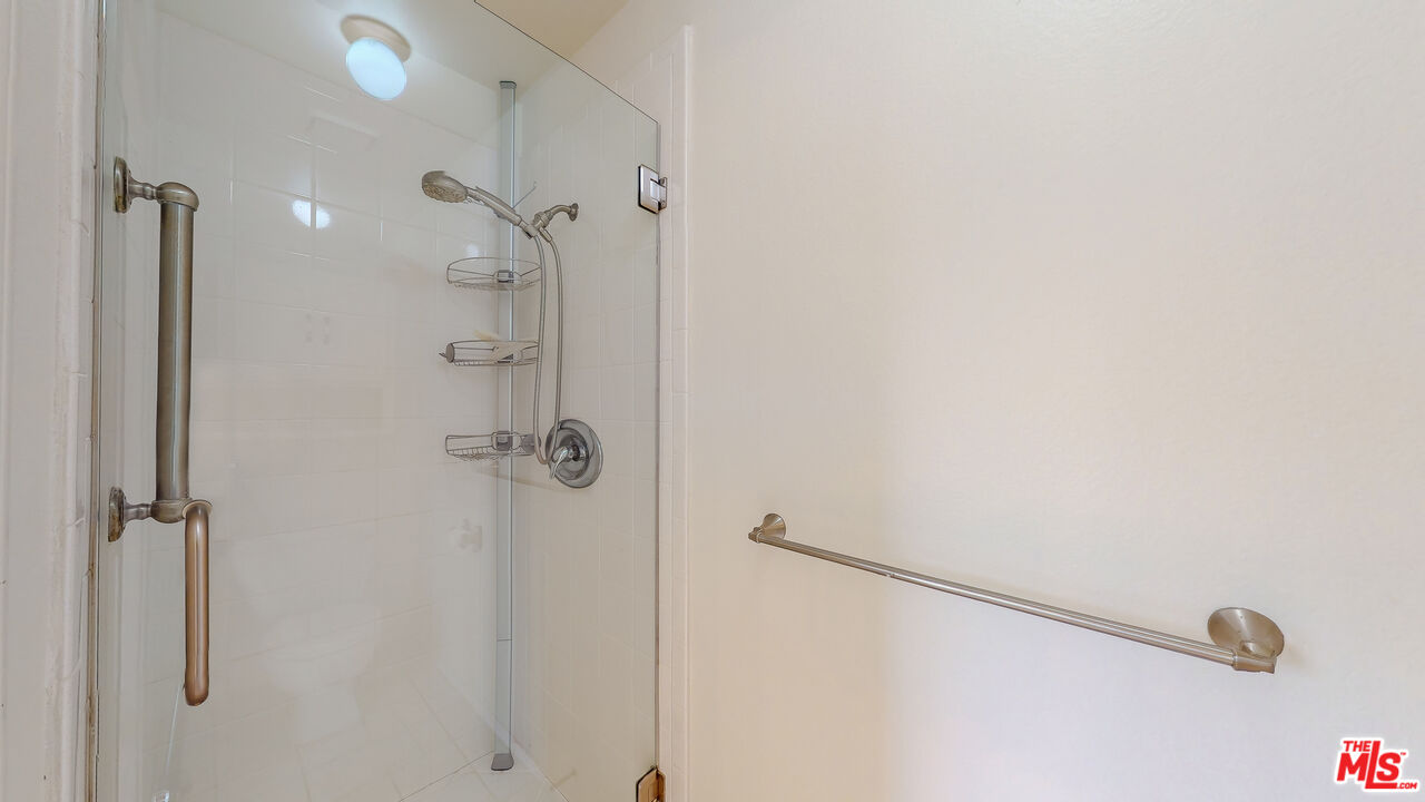17 Firestone Irvine, CA 92614 - Photo 33 of 75 a bathroom with a shower