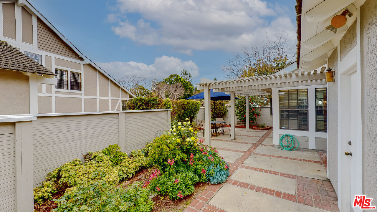 17 Firestone Irvine, CA 92614 - Photo 45 of 75 a front view of a house with garden