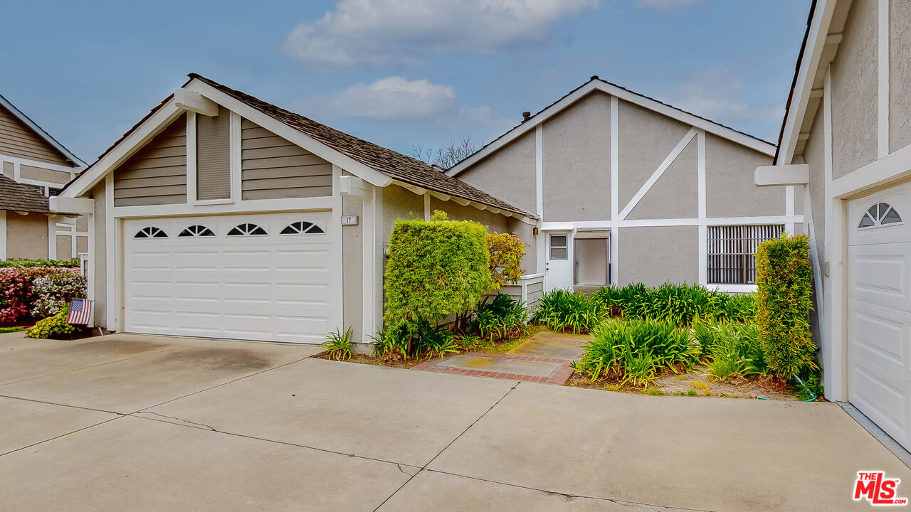 17 Firestone Irvine, CA 92614 - Photo 47 of 75 a front view of a house with a yard