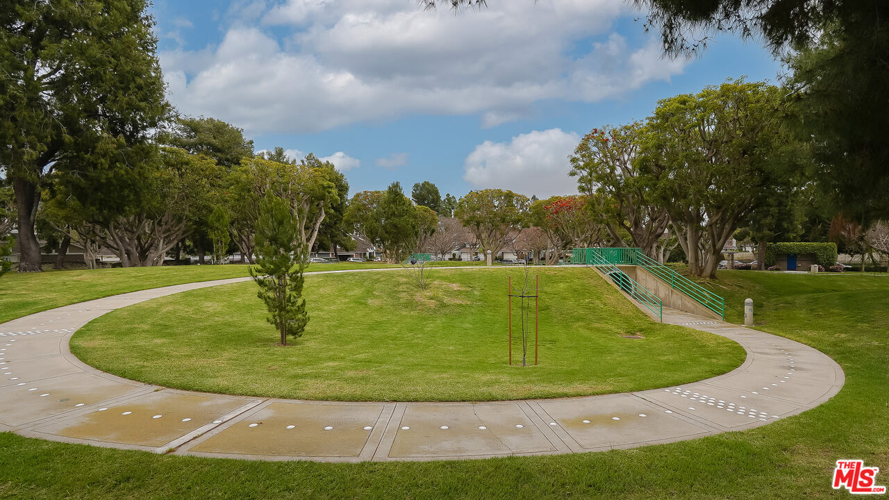 17 Firestone Irvine, CA 92614 - Photo 68 of 75 a view of a swimming pool with a yard