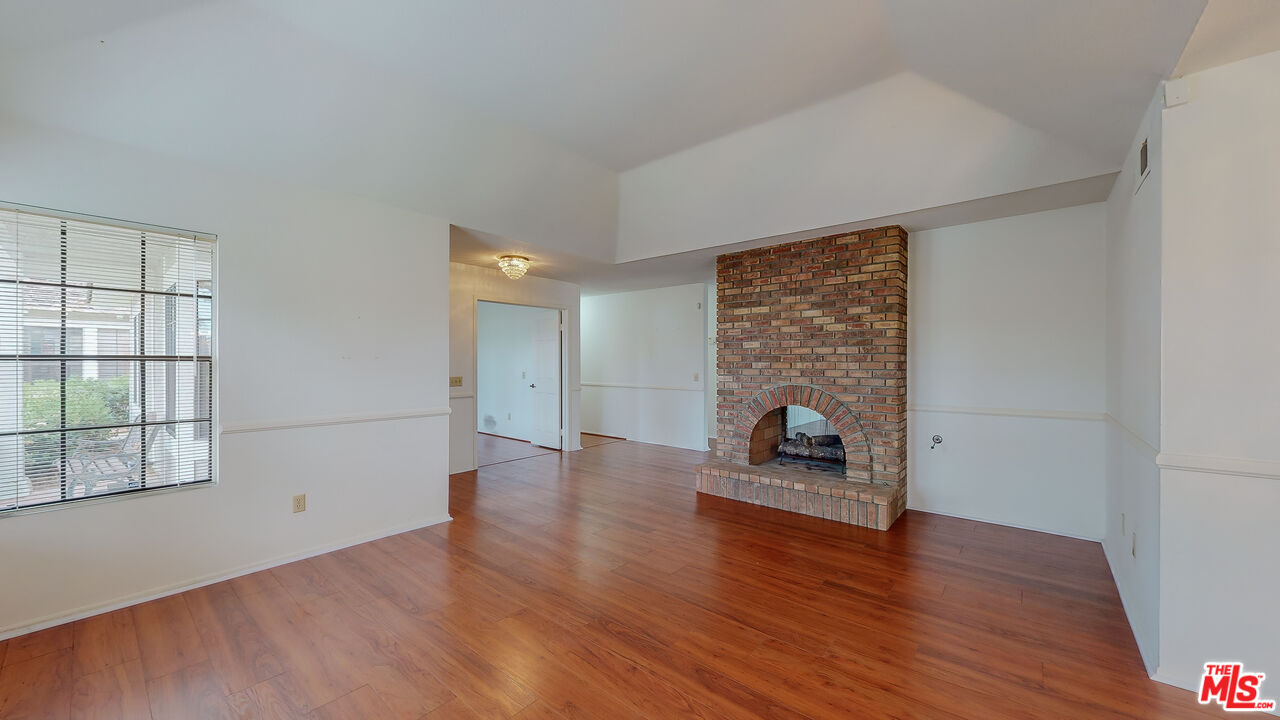 17 Firestone Irvine, CA 92614 - Photo 10 of 75 wooden floor in an empty room with a window