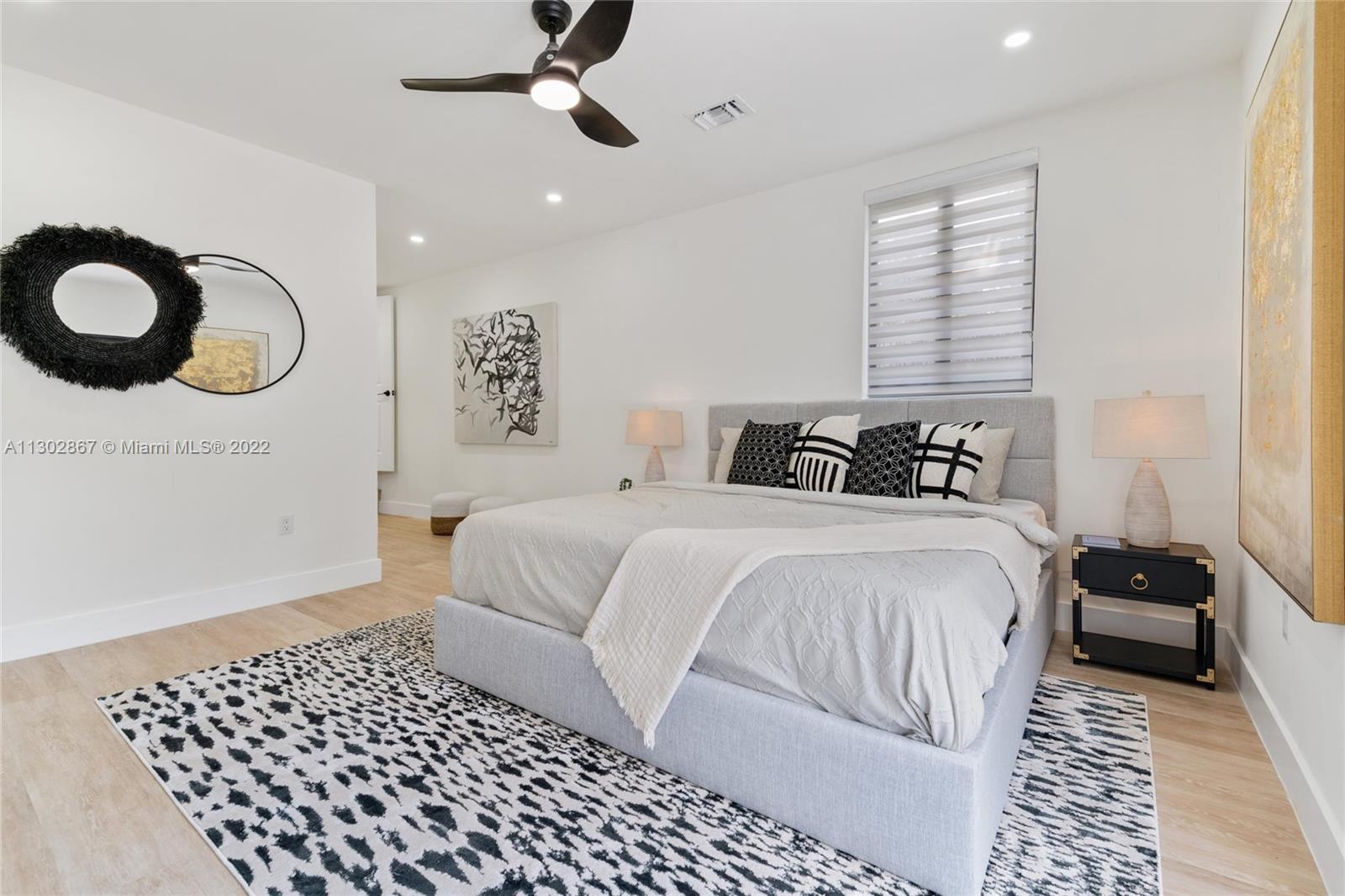 2324 Southwest 58th Court Miami, FL 33155 - Photo 16 of 25 a bedroom with a bed and a window