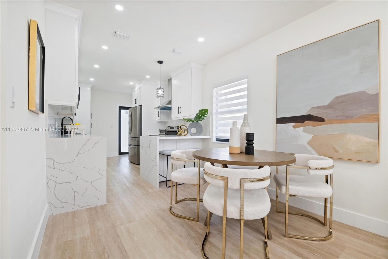 2324 Southwest 58th Court Miami, FL 33155 - Photo 7 of 25 a view of a dining room with furniture and wooden floor