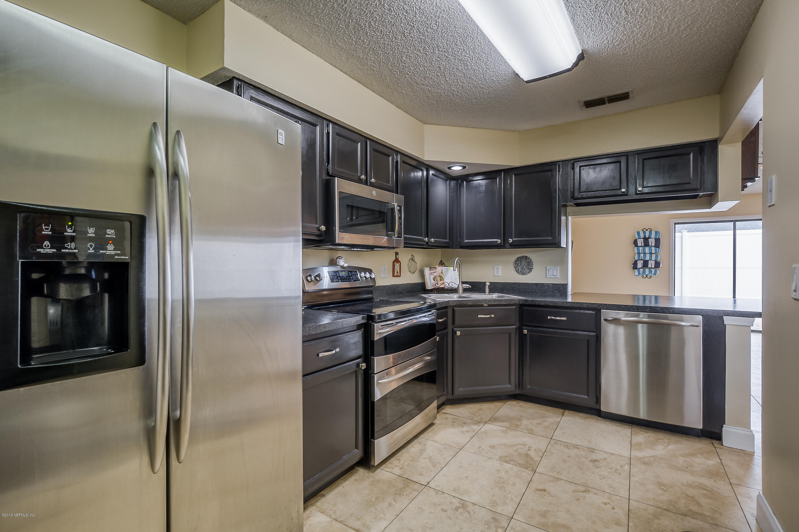 8455 Ivey Road Jacksonville, FL 32216 - Photo 2 of 22 upgraded kitchen