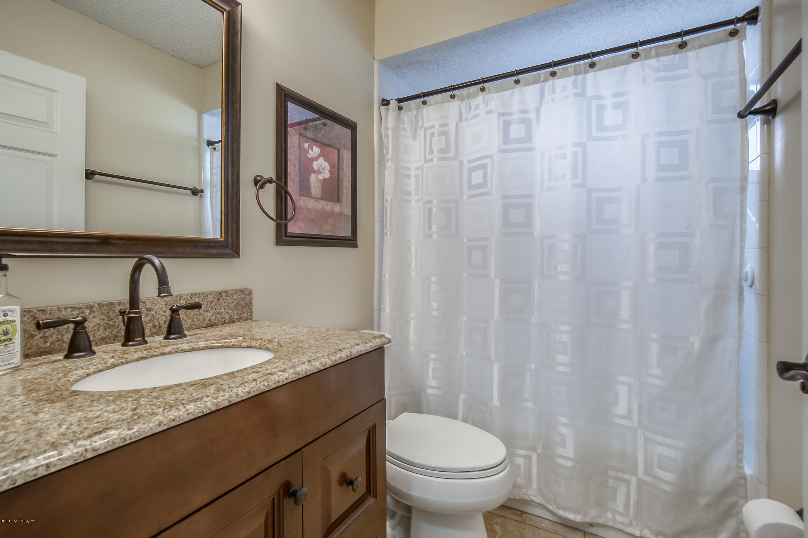8455 Ivey Road Jacksonville, FL 32216 - Photo 16 of 22 guest bathroom