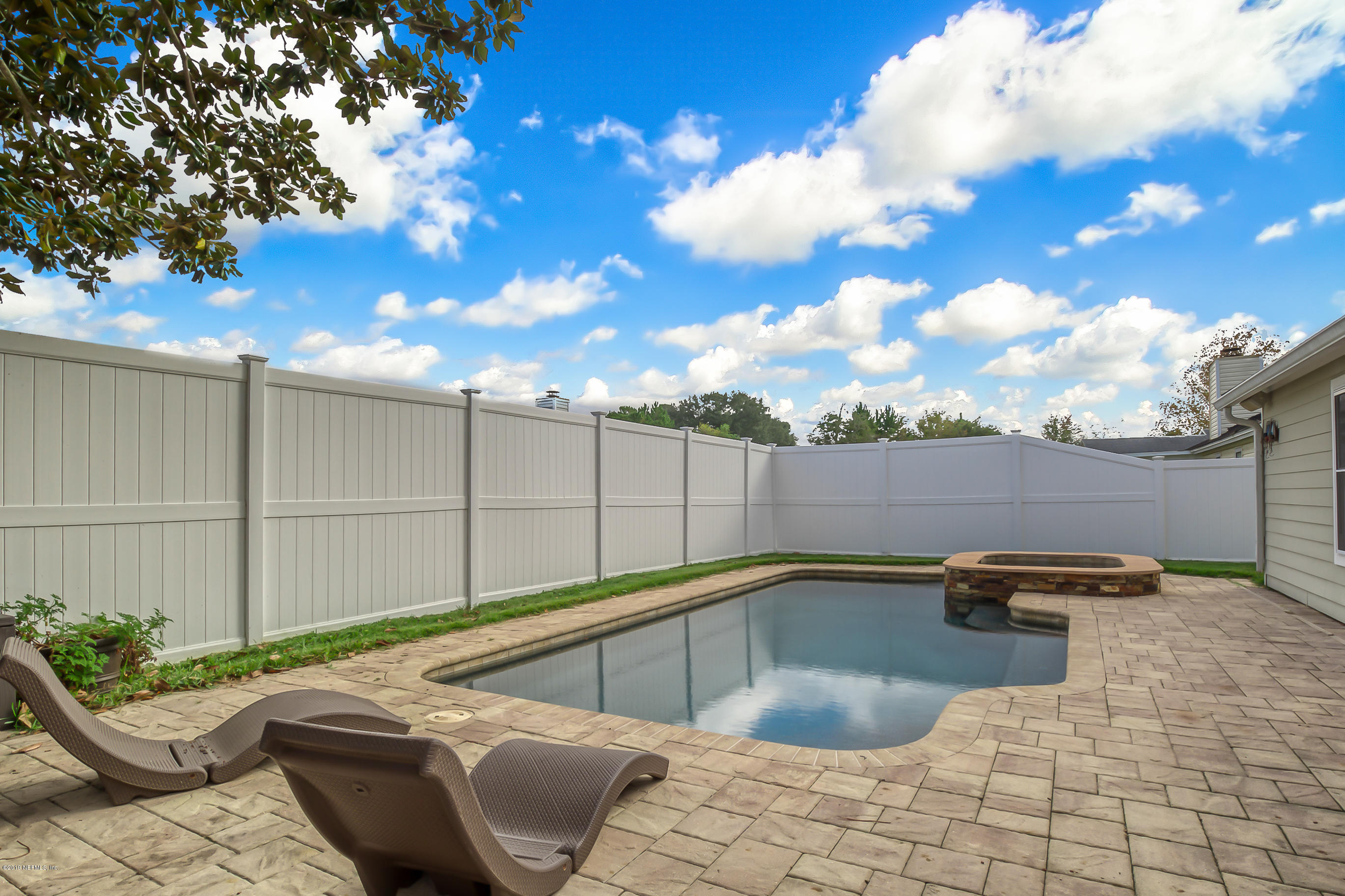 8455 Ivey Road Jacksonville, FL 32216 - Photo 18 of 22 fenced in pool