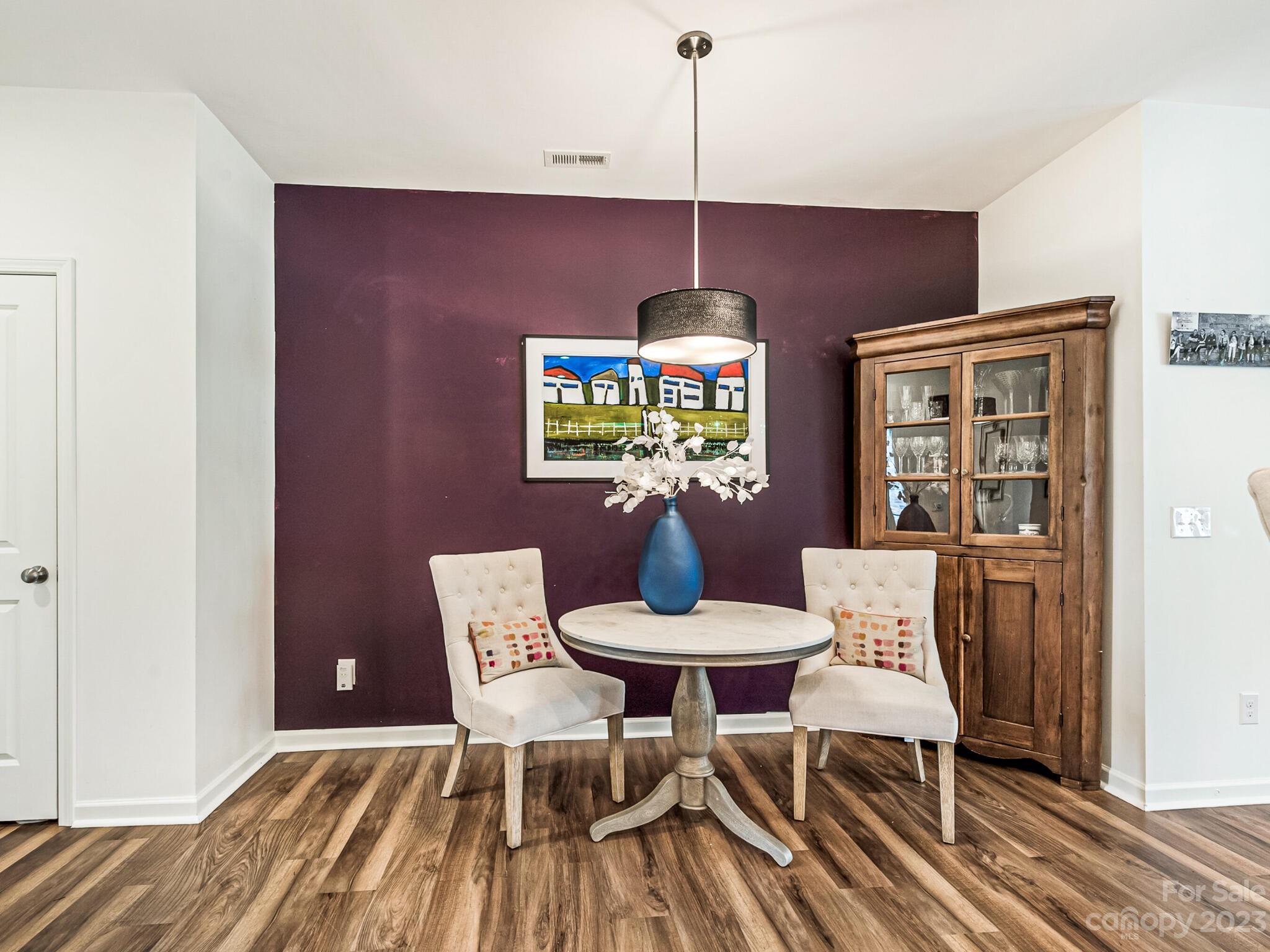 907 Wicawa Road Fort Mill, SC 29708 - Photo 8 of 25 a view of a dining room with furniture and chandelier
