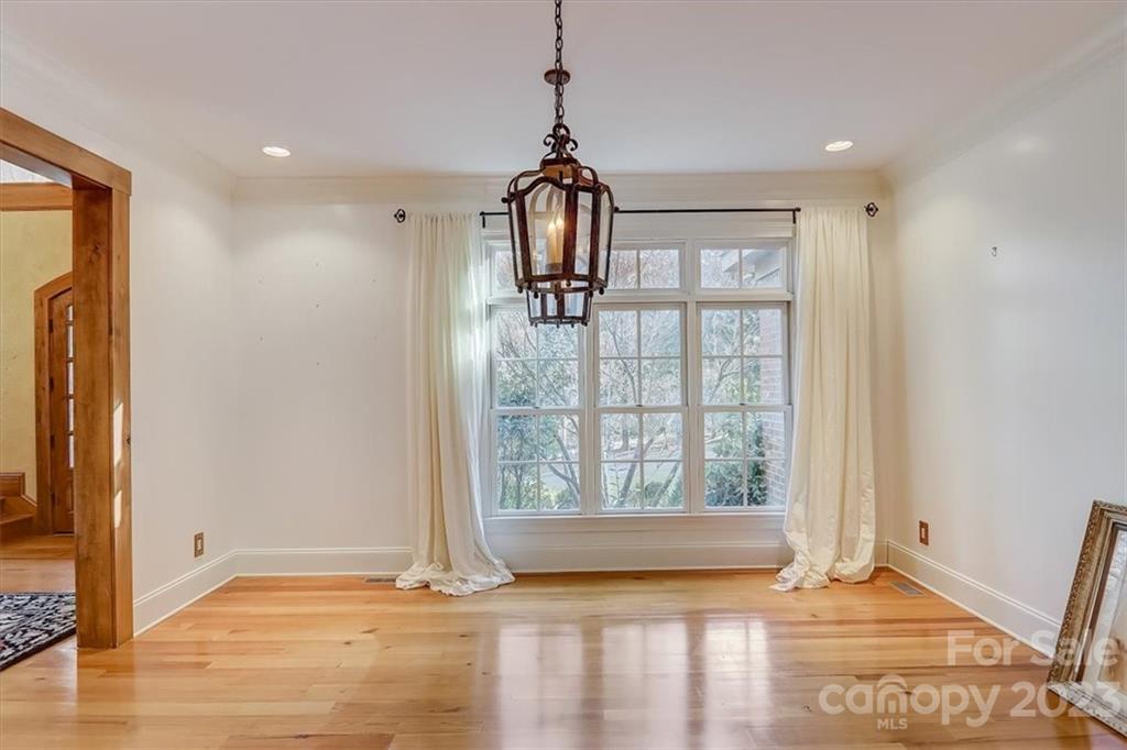 99 Mullally Drive Flat Rock, NC 28731 - Photo 13 of 48 a view of a room with wooden floor and windows