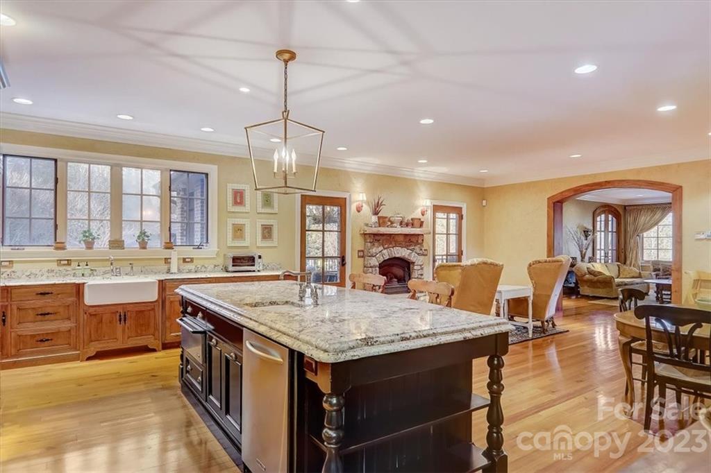 99 Mullally Drive Flat Rock, NC 28731 - Photo 16 of 48 a open kitchen with stainless steel appliances granite countertop a stove and refrigerator