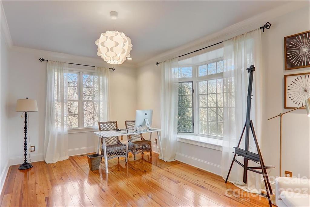 99 Mullally Drive Flat Rock, NC 28731 - Photo 22 of 48 a view of a dining room with furniture window and outside view