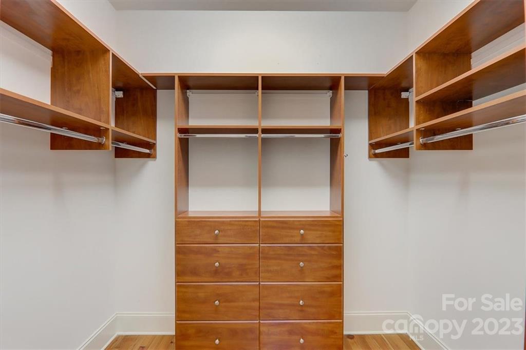 99 Mullally Drive Flat Rock, NC 28731 - Photo 27 of 48 a view of walk in closet with empty racks
