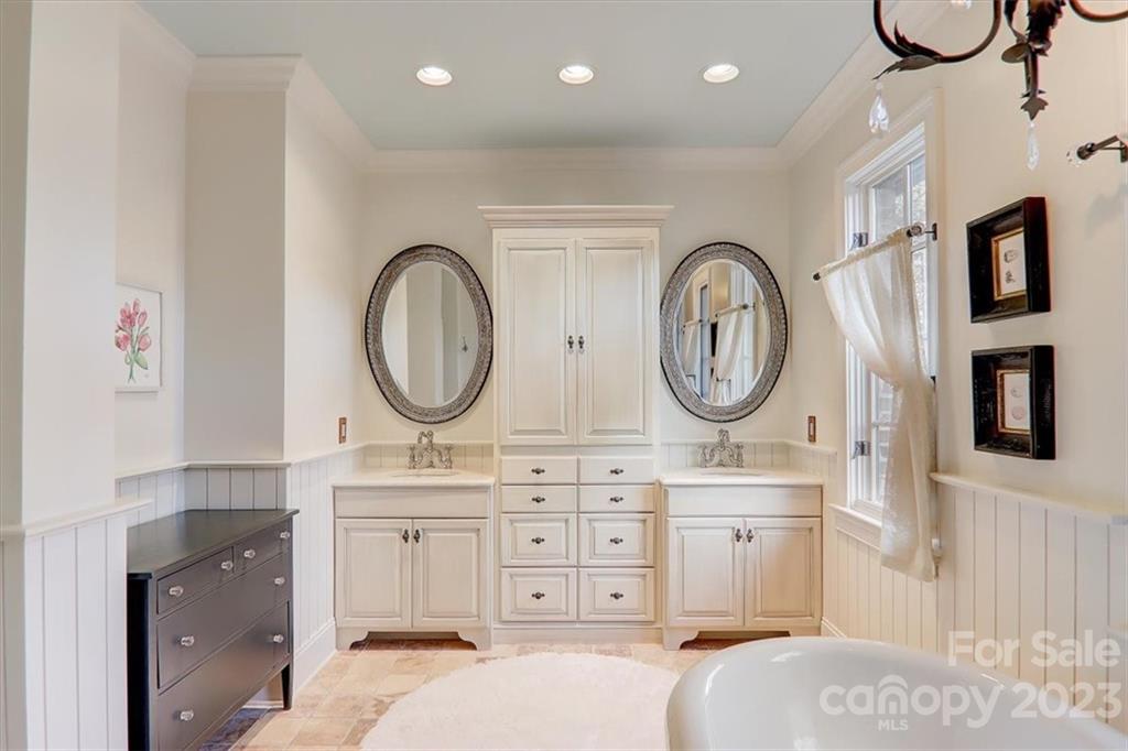 99 Mullally Drive Flat Rock, NC 28731 - Photo 31 of 48 a bathroom with a sink and a mirror