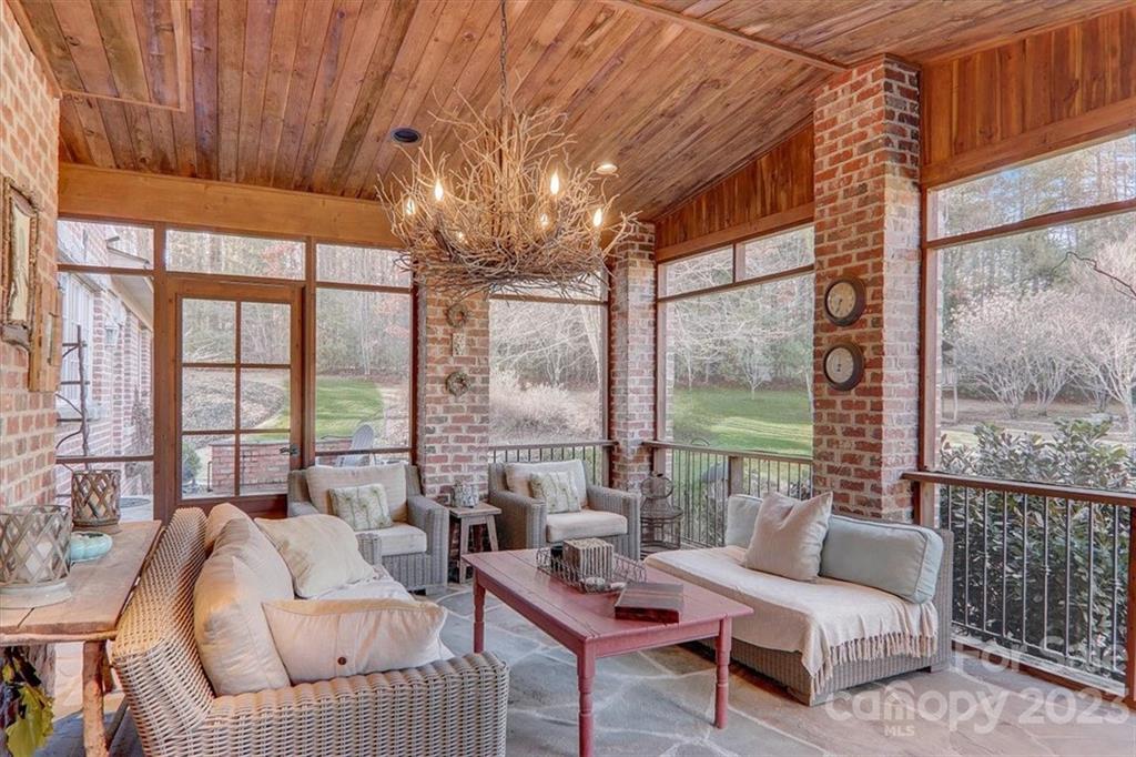 99 Mullally Drive Flat Rock, NC 28731 - Photo 40 of 48 a living room with furniture and a large window